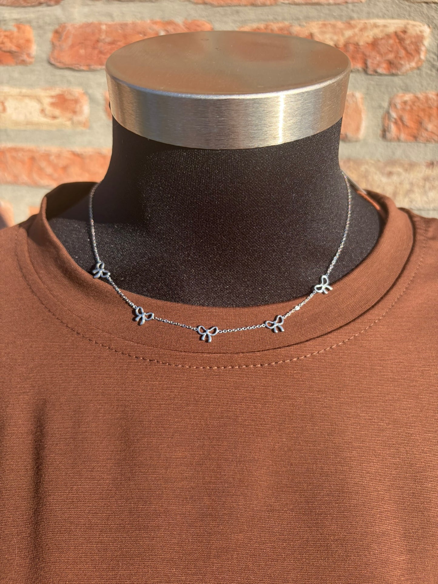 Ketting strikjes zilver